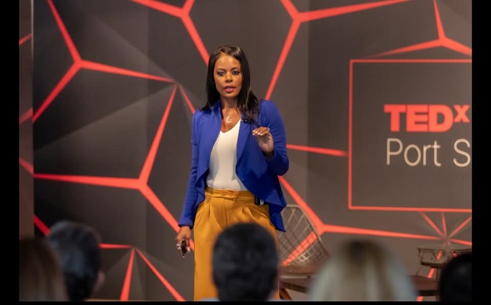 Cendie Stanford speaking on the TEDxPort Saint Lucie stage